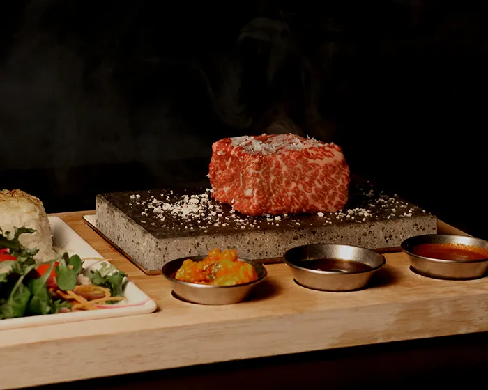 steak on a hotstone at komo